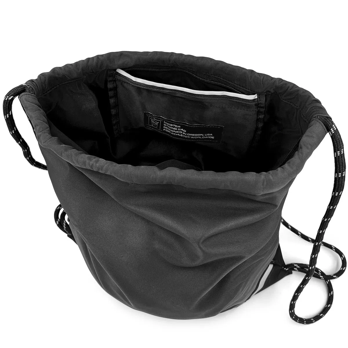 Meister Mochila XL con Cordón - Bolsa de Cuerda Impermeable para Gimnasio - Negra/Reflectante | Bolsillo externo con cremallera y accesorio interno con detalles reflectantes para mayor visibilidad
